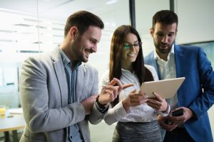 picture-of-businesspeople-using-digital-tablet-in-NFHXAUS